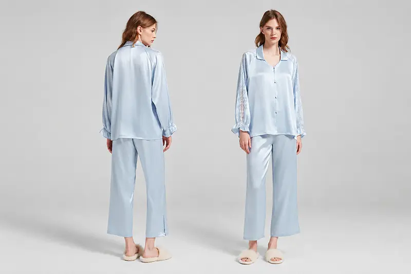 Light blue long-sleeve silk pajama shirt and trousers shown from the front and back