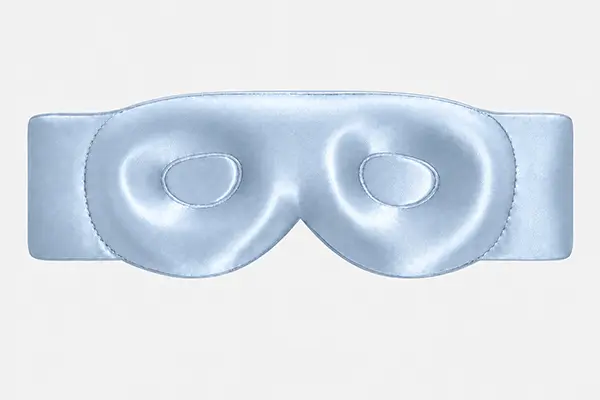 Pale blue contoured silk sleep mask with two eye cups and a wide plain strap