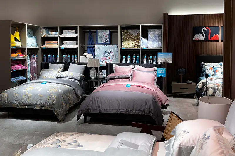 Showroom beds dressed with contrasting bedding and pillowcase colors
